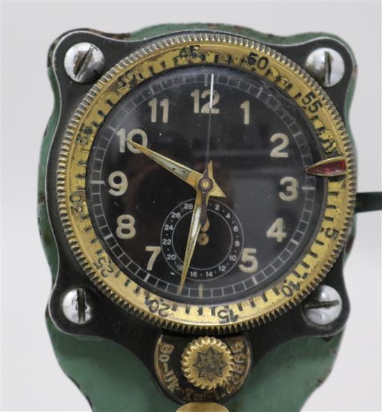 A Messerschmitt cockpit timepiece, numbered 30600, mounted on a piston head, 5.25in.